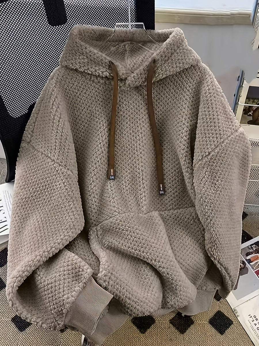 Unisex teddyfleece hoodie med dragsko och magficka