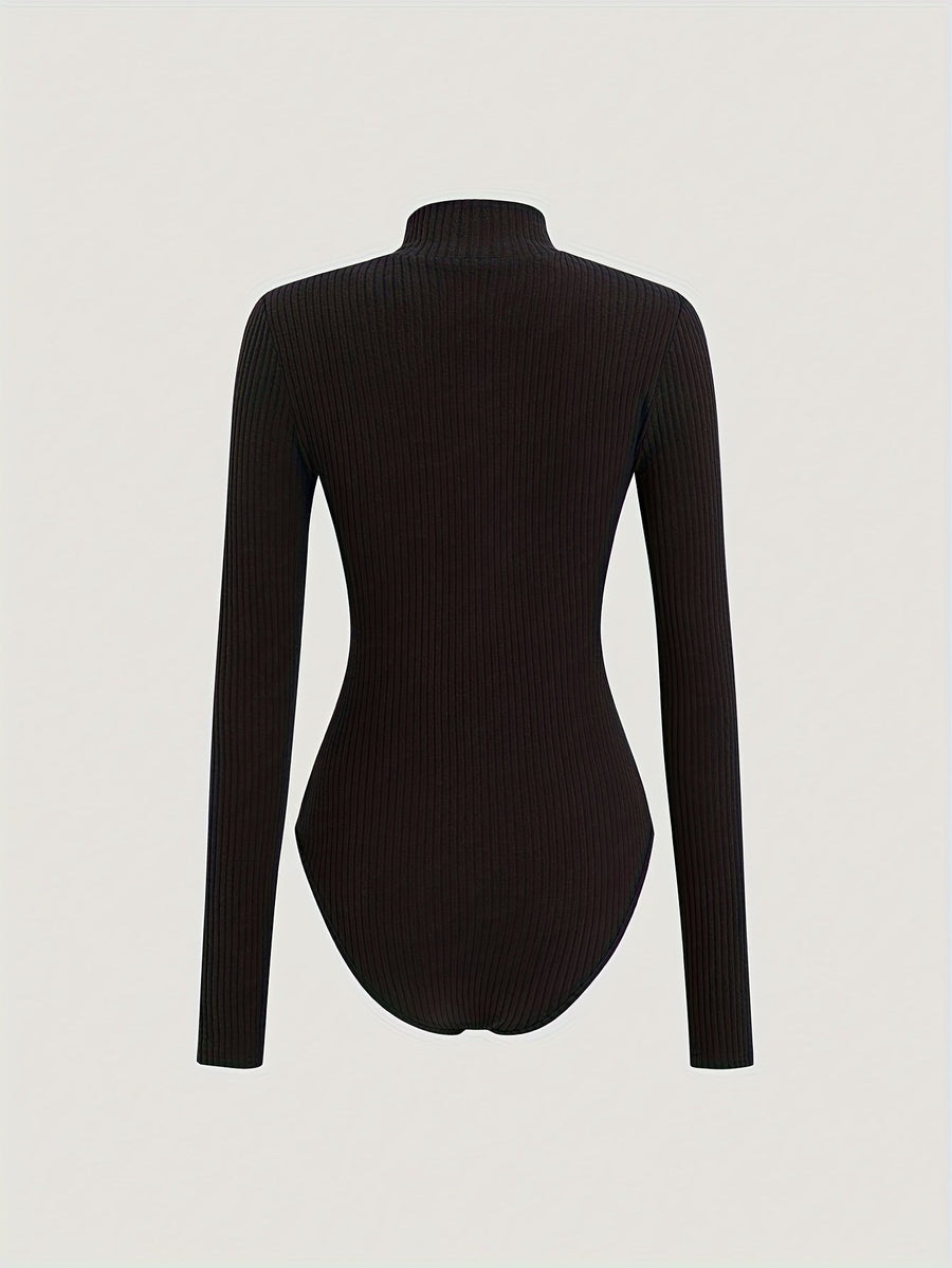 Dam ribbad bodysuit med dragkedja, hög hals och lång ärm i grått och svart