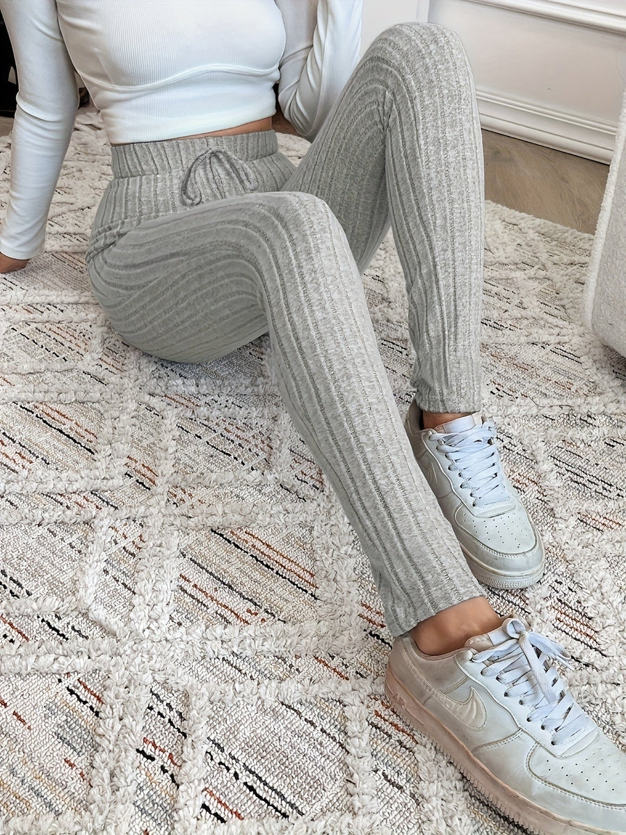 Ribbstickade leggings med hög midja och dragsko för dam