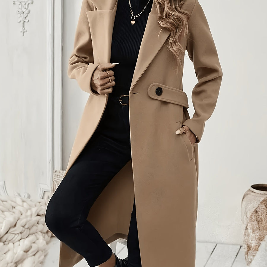 Damkappa med slag och fickor, lång modell i enfärgad design