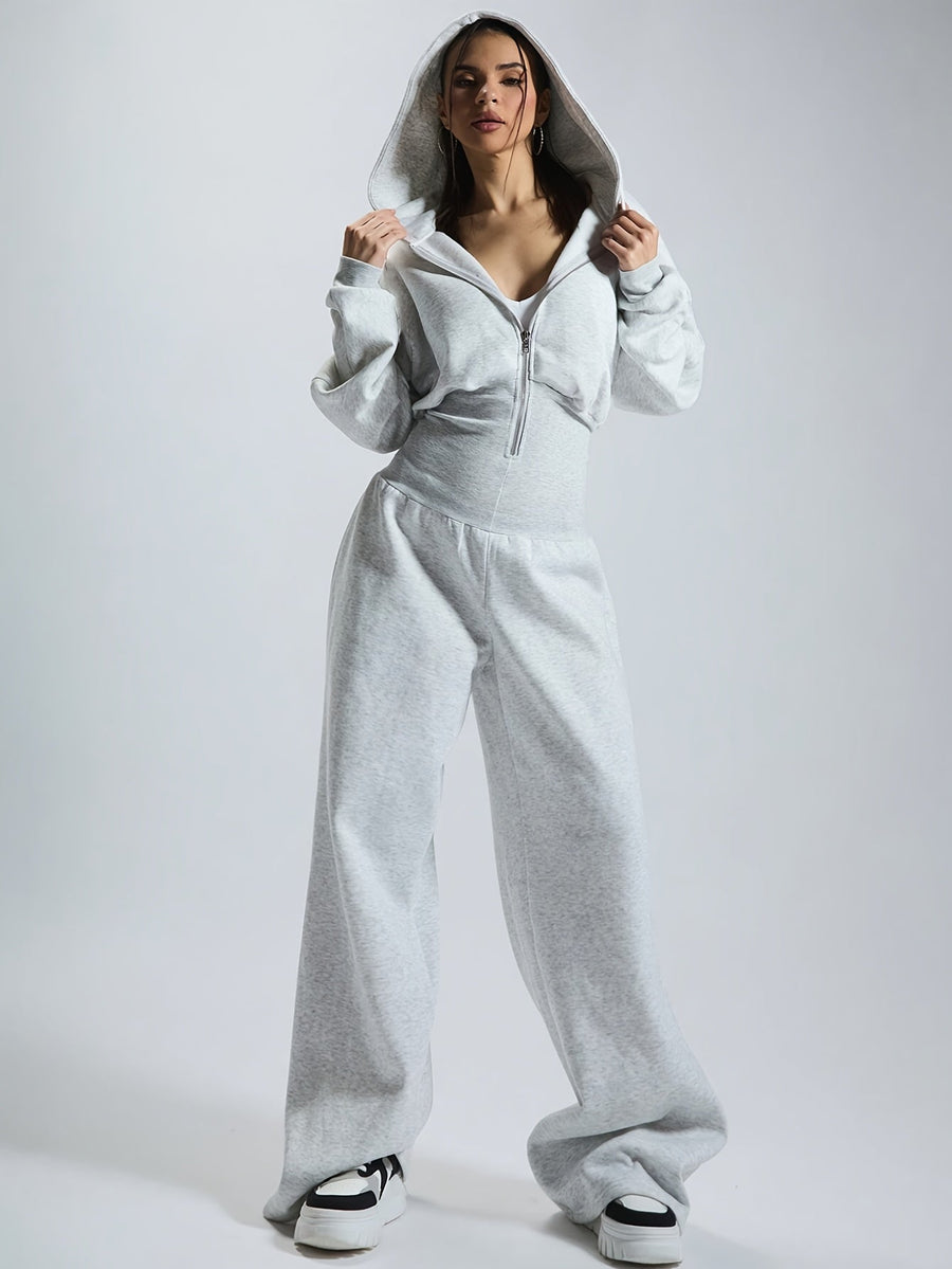 Dam jumpsuit med huva och dragkedja, vida ben