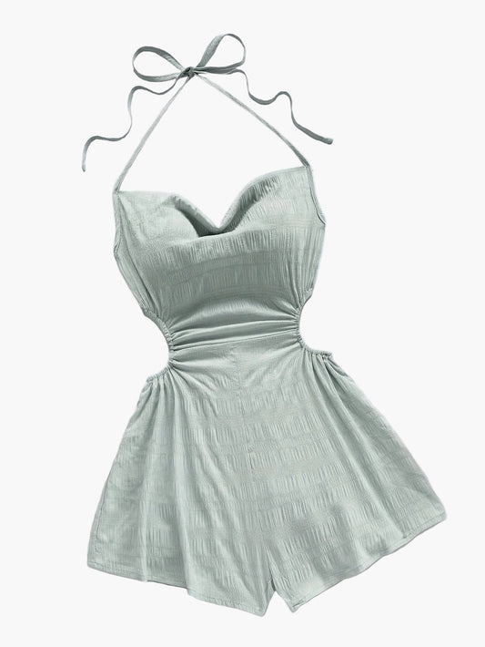 Dam Playsuit med Halterneck och Cut-Out – Trendig Sommarstil för Semester och Strand