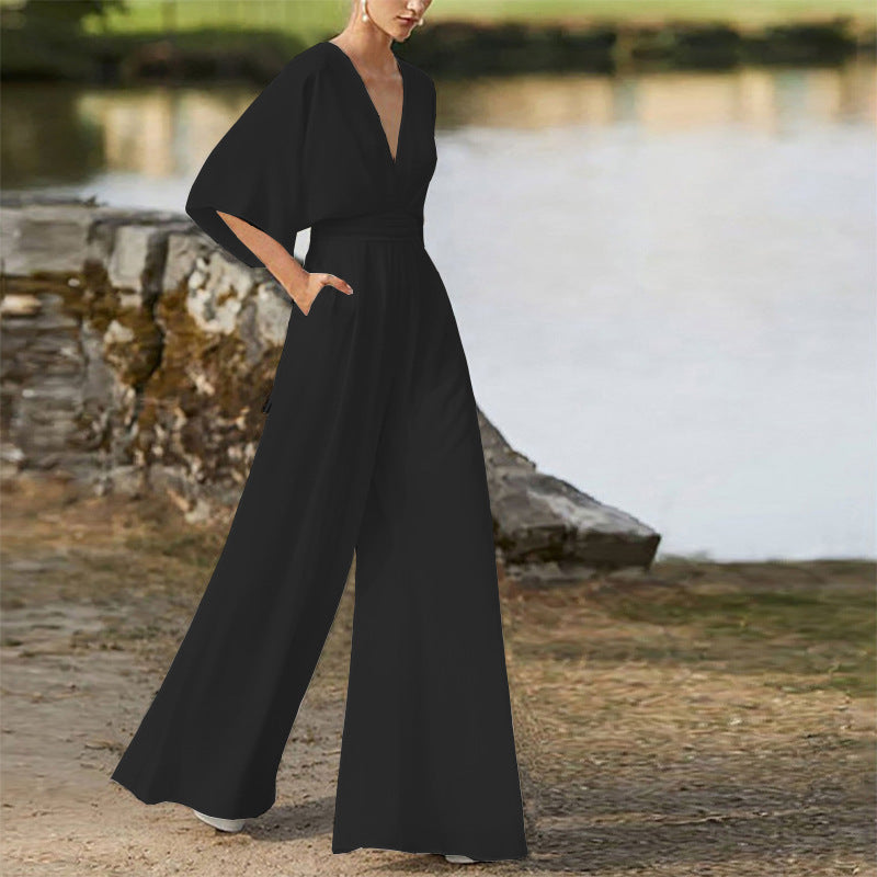Rebecca – Klänning Jumpsuit med Djup V-hals och Hög Midja