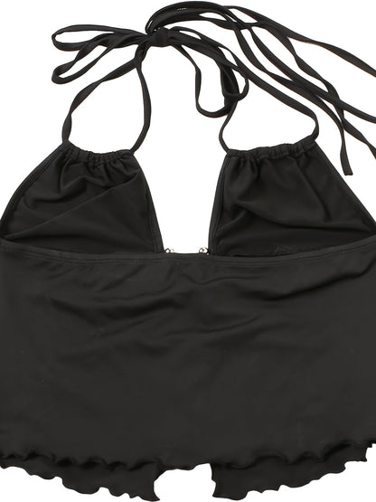 Dam Halterneck Festtopp med Ringdetalj – Modern Partylook och Trendig Design