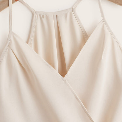 Dam Halterneck Draperad Ärmlös Blus – Trendig och Elegant för Vardag och Fest
