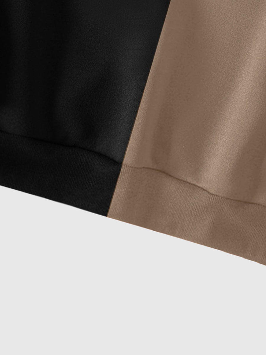 Hoodie med dragkedja och ansiktsmönster i tvåfärgad design