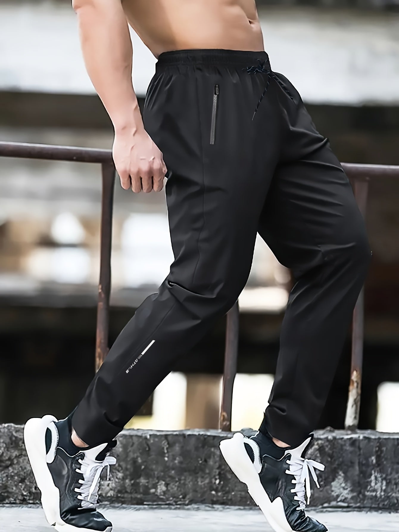 Herrarnas sportiga joggingbyxor för träning och fritid – avslappnad stil med dragkedjefickor