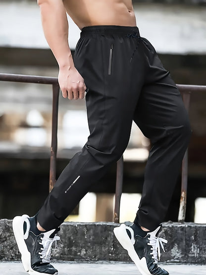 Herrarnas sportiga joggingbyxor för träning och fritid – avslappnad stil med dragkedjefickor