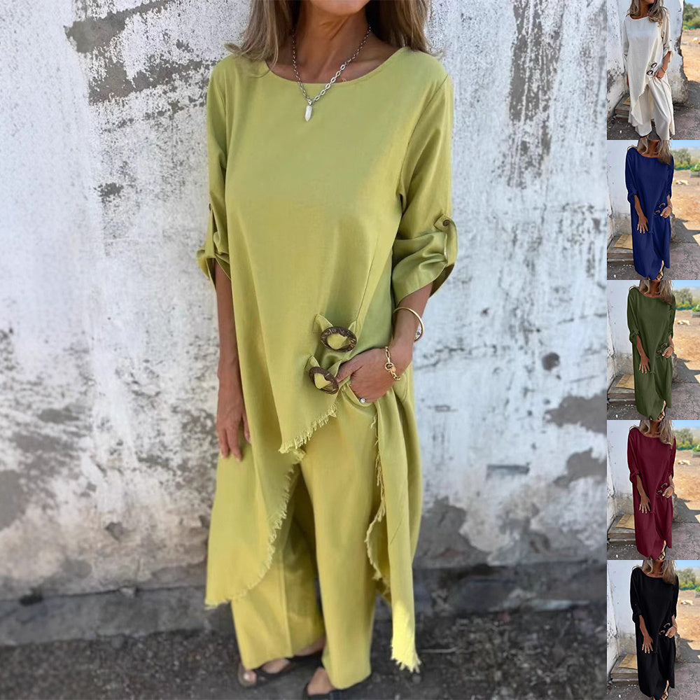 Imogen – Lång kostym med metallknappdesign och rund hals, långärmad topp och raka byxor