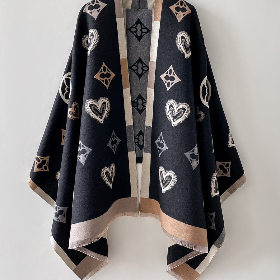 Poncho med mönster och fransar – Svart eller Flerfärgad