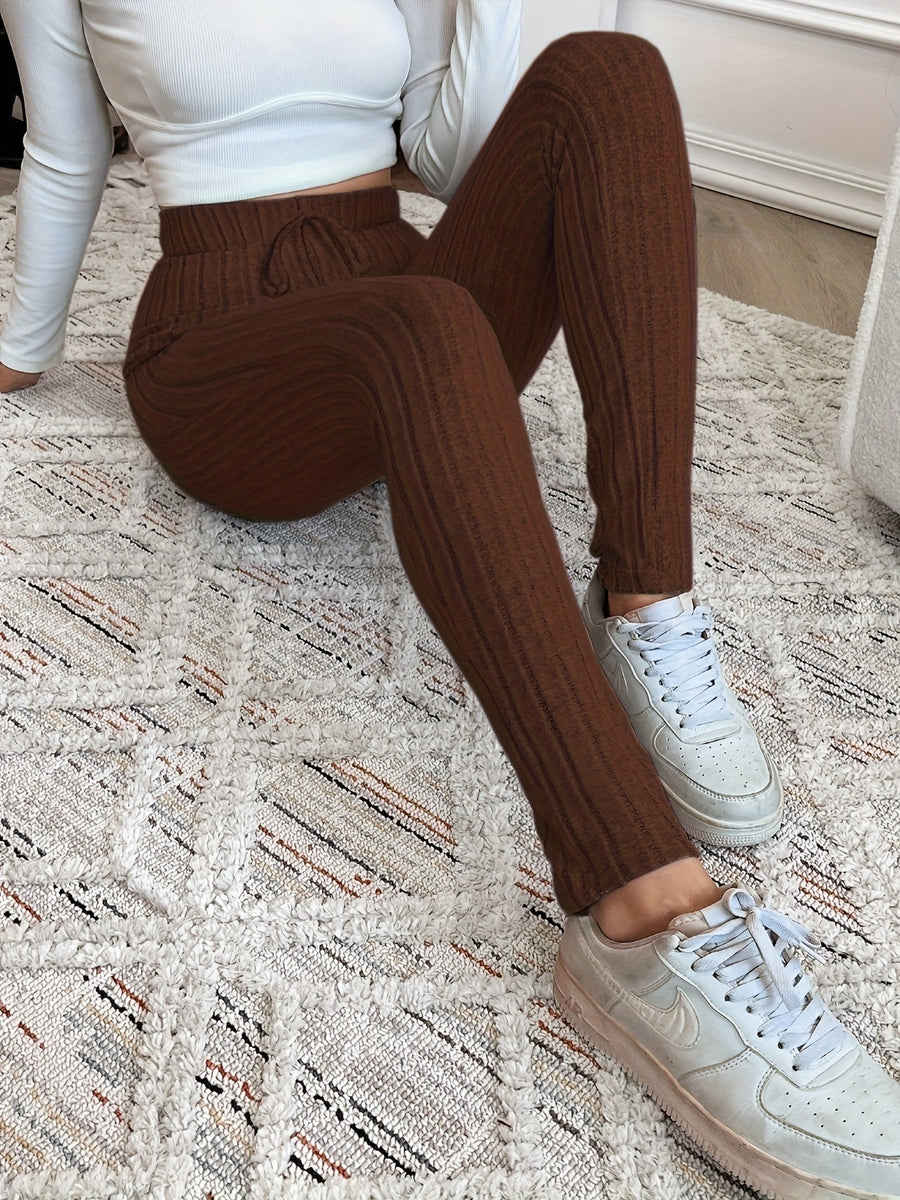 Ribbstickade leggings med hög midja och dragsko för dam