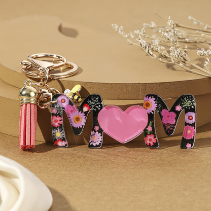 Nyckelring för kvinnor – Blommig MAMMA med hjärta och tofs – Perfekt present till mamma, modeaccessoar