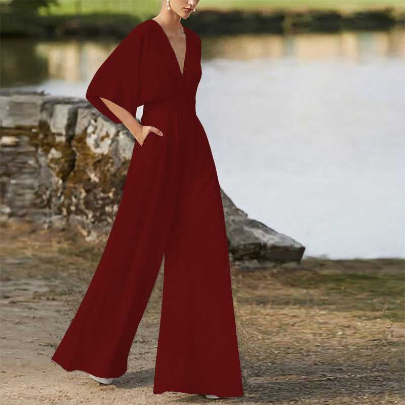 Rebecca – Klänning Jumpsuit med Djup V-hals och Hög Midja