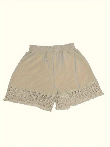 Damshorts med volangmidja och spetsdetaljer – Semesterstil och vardagskomfort