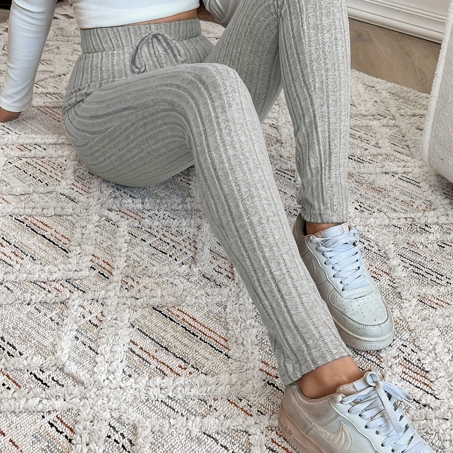 Ribbstickade leggings med hög midja och dragsko för dam