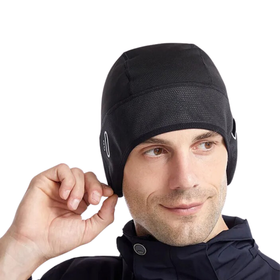 Träningsmössa med öronlappar och reflexdetalj