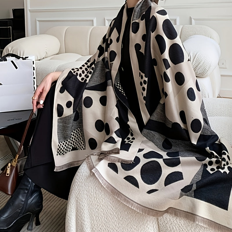 Svart och beige mönstrad scarf med fransar, stora och små prickar