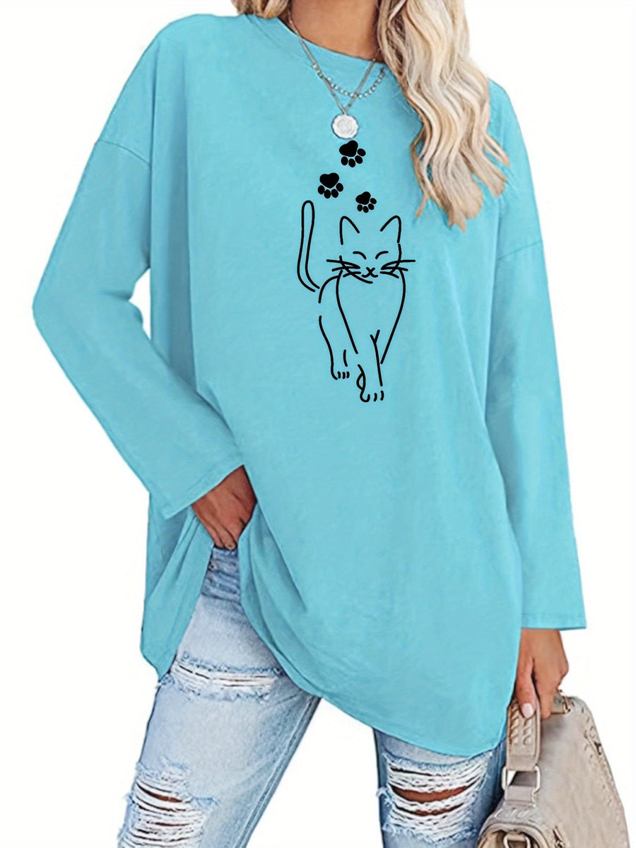 Svart långärmad tröja med kattmotiv och tassavtryck, oversized passform