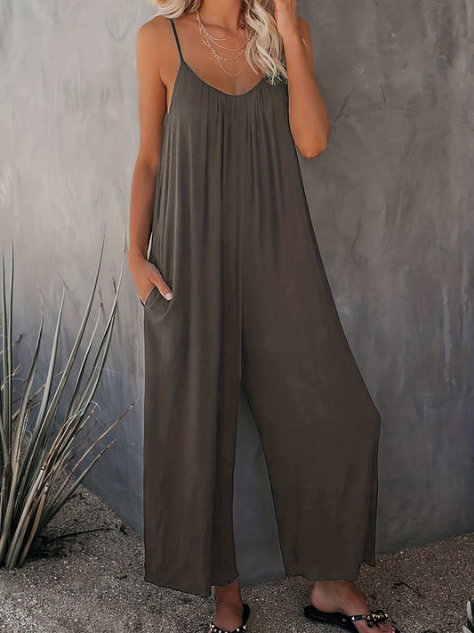 Dam Jumpsuit med Spaghettiband och Fickor – Avslappnad och Trendig Sommarstil
