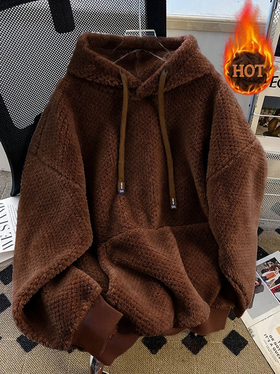 Unisex teddyfleece hoodie med dragsko och magficka