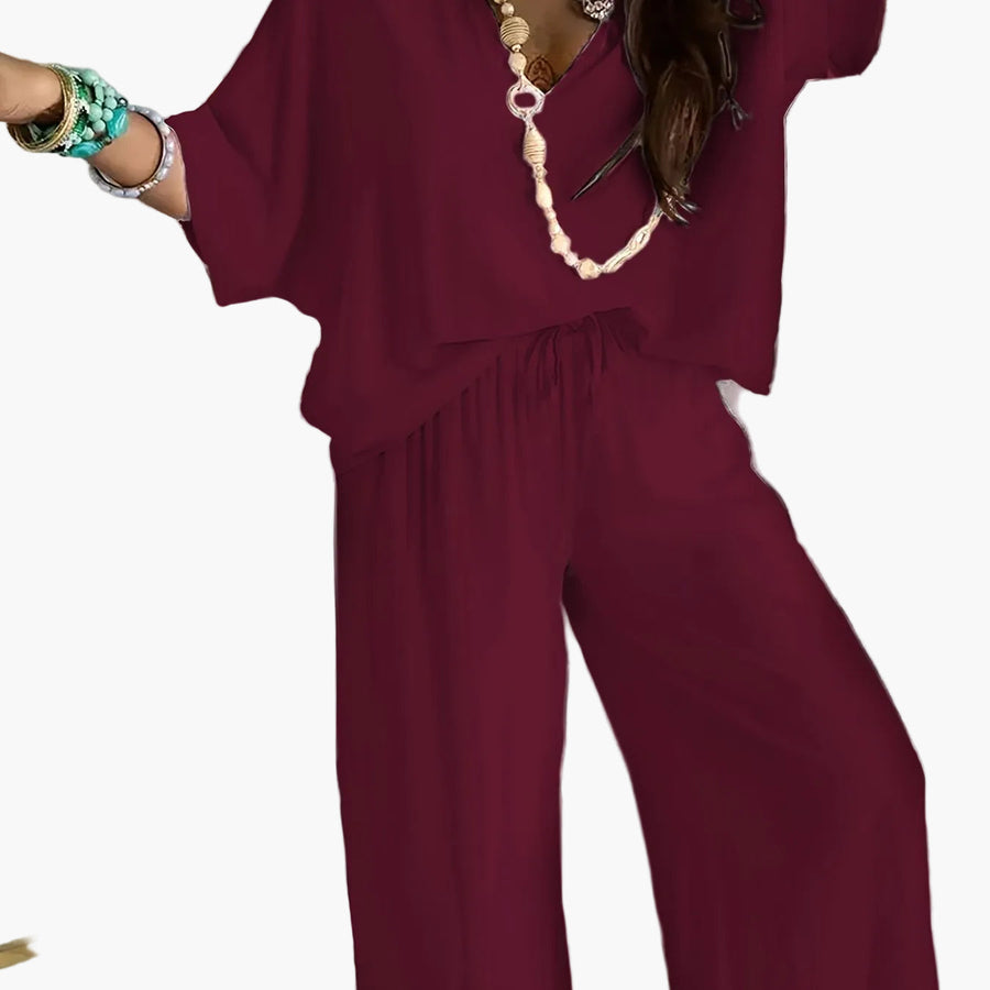 Dam Jumpsuit med V-ringning och Vida Ben – Avslappnad Sommarstil för Fritid och Semester