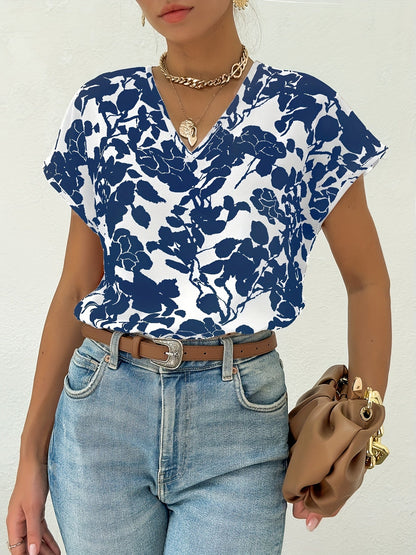 Dam Elegant Blus med Blommönster och V-ringning – Perfekt för Sommar och Vardag