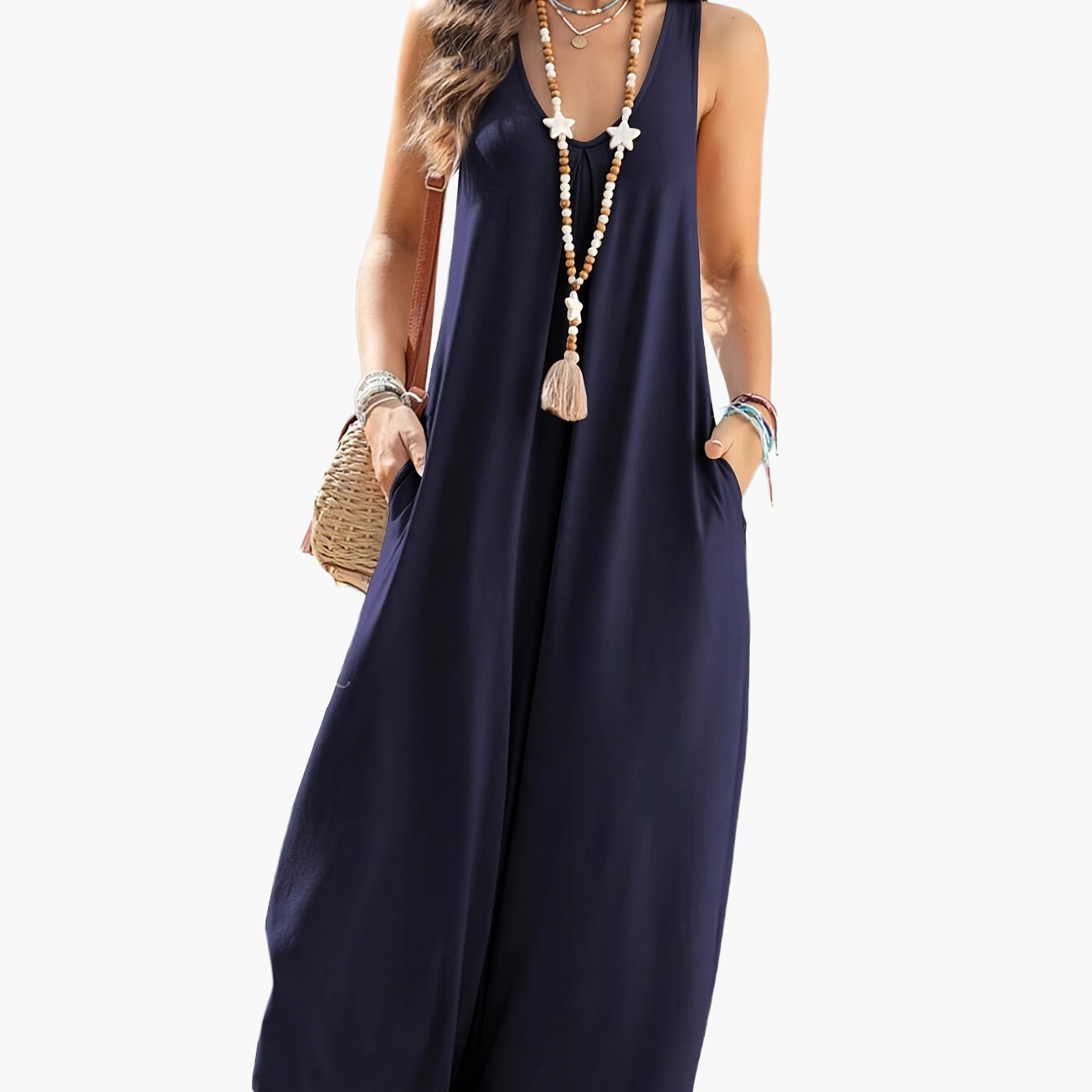 Dam Jumpsuit med V-ringning och Vida Ben – Elegant och Avslappnad Sommardräkt