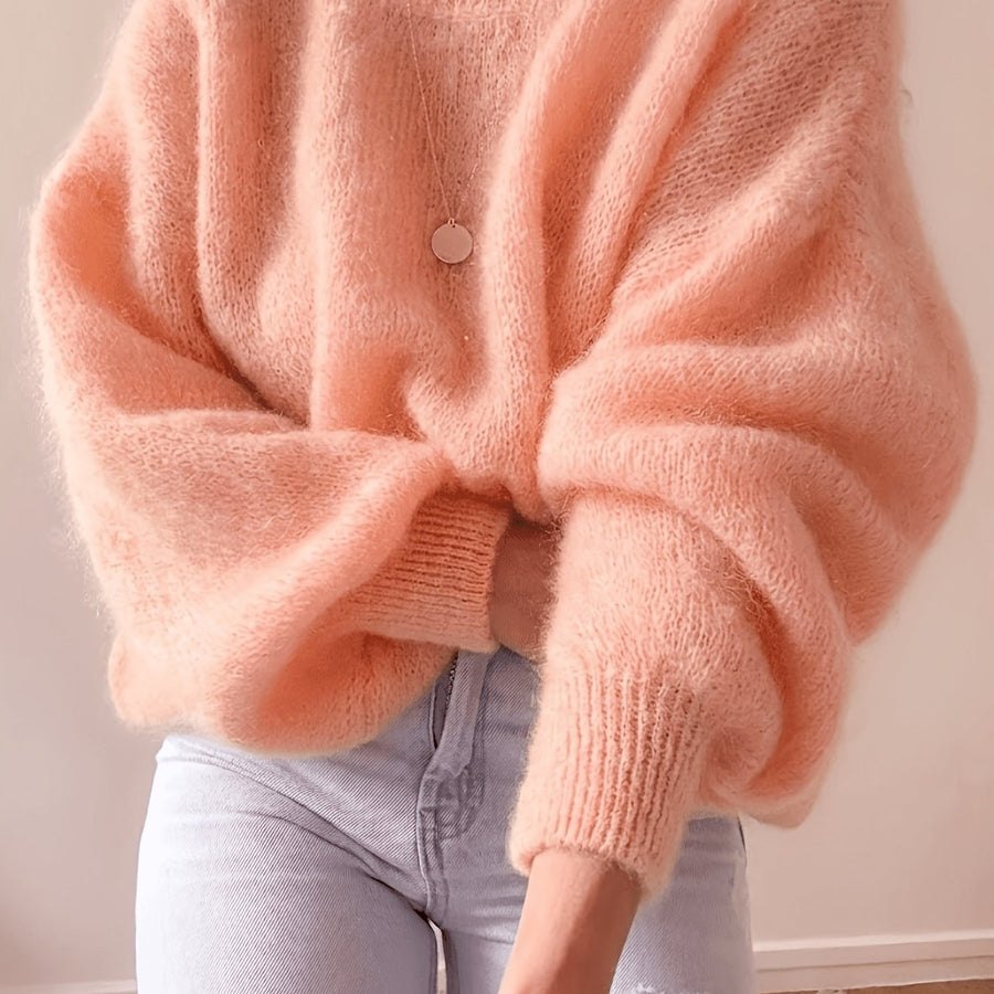 Lösstickad tröja med rund hals och lång ärm - Fluffig design med ribbstickade muddar