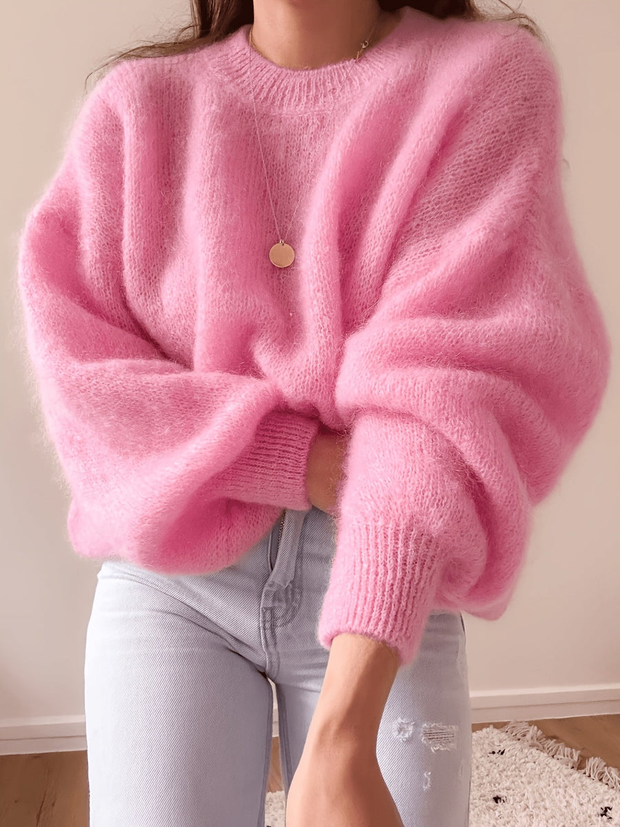 Lösstickad tröja med rund hals och lång ärm - Fluffig design med ribbstickade muddar