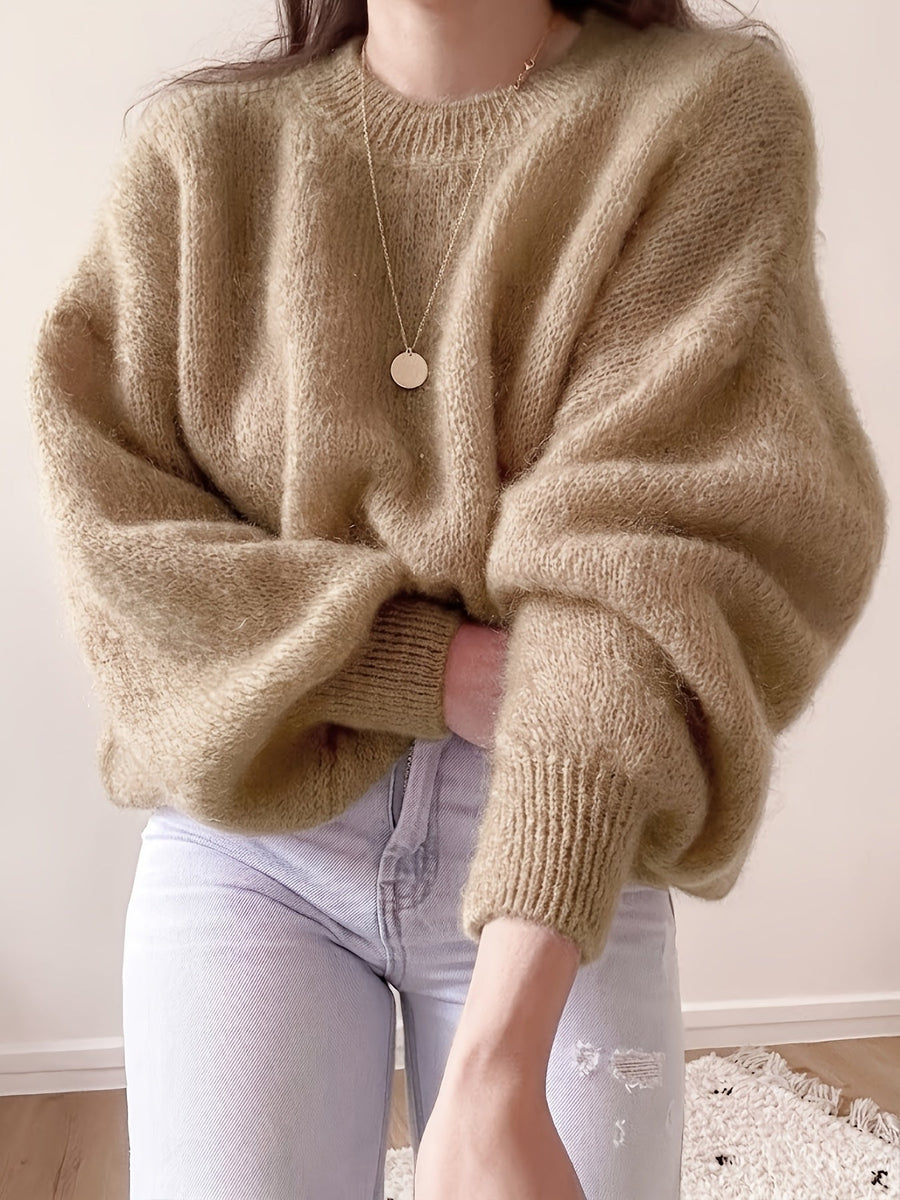 Lösstickad tröja med rund hals och lång ärm - Fluffig design med ribbstickade muddar