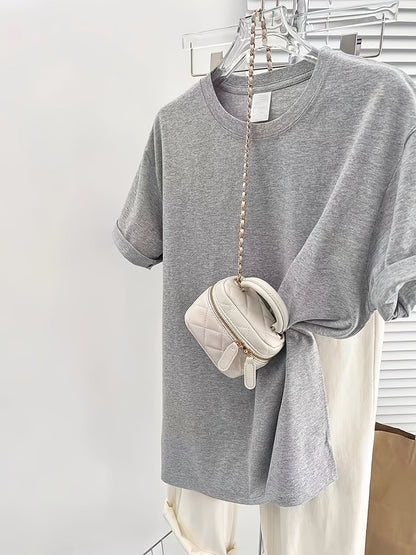 Dam T-shirt med klassisk passform och minimalistisk stil för vardagsbruk
