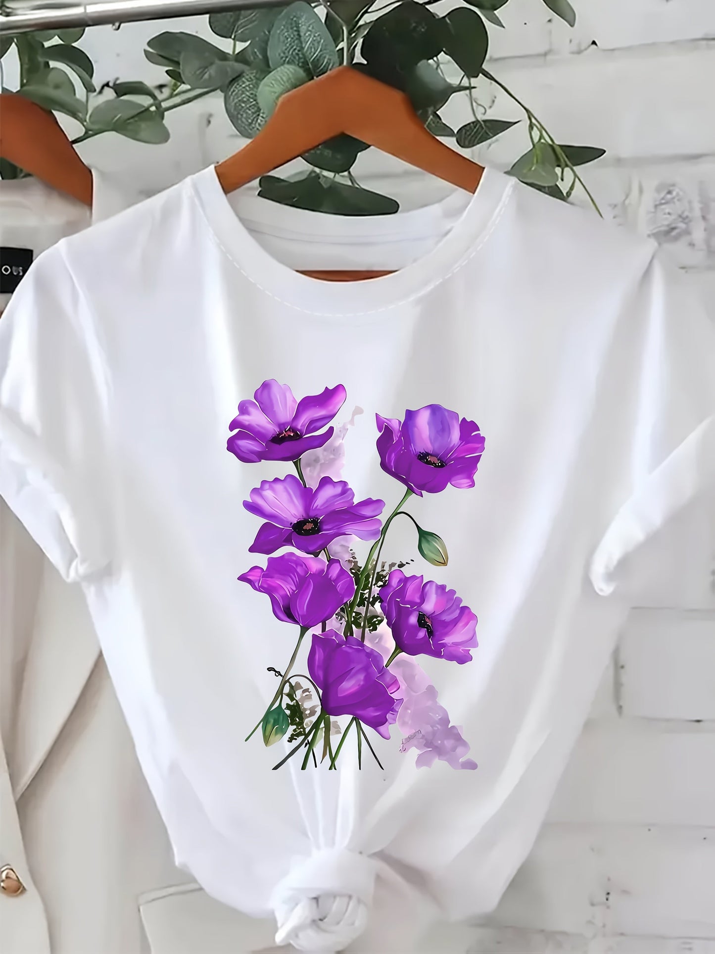Dam T-shirt med blomstertryck – avslappnad stil för vardag och sommar