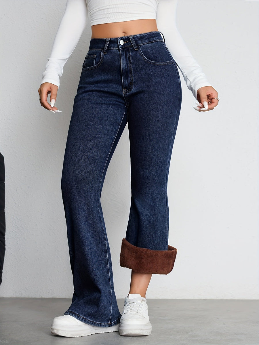 Mörkblå utsvängda damjeans med hög midja