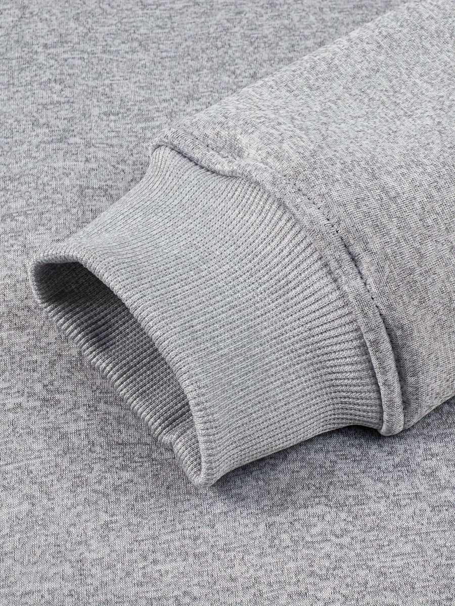 Grå teddyfodrad hoodie med dragkedja och huva