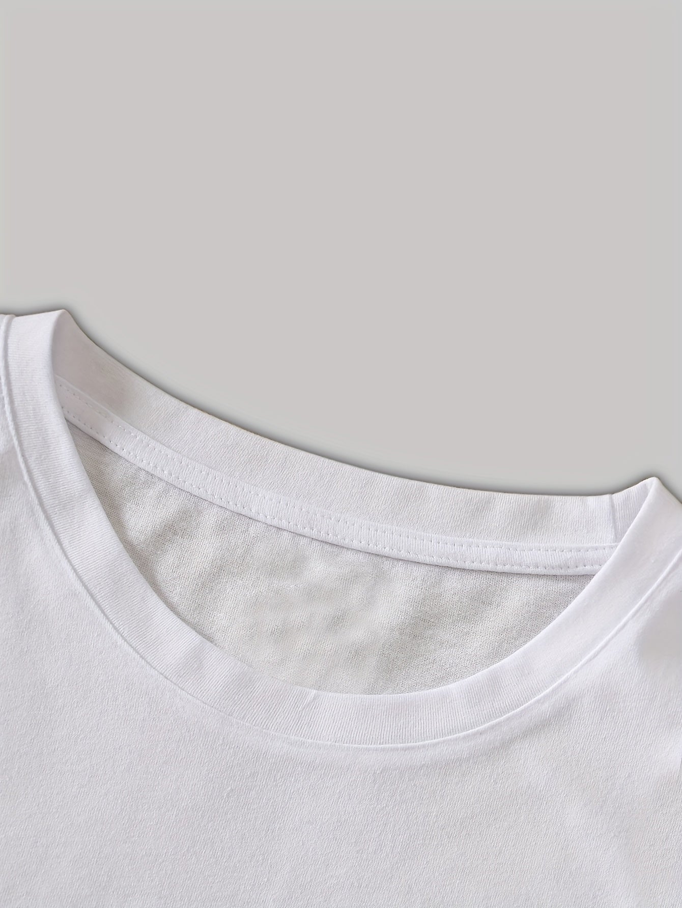 Dam T-shirt med abstrakt geometriskt tryck – avslappnad och trendig vardagsstil