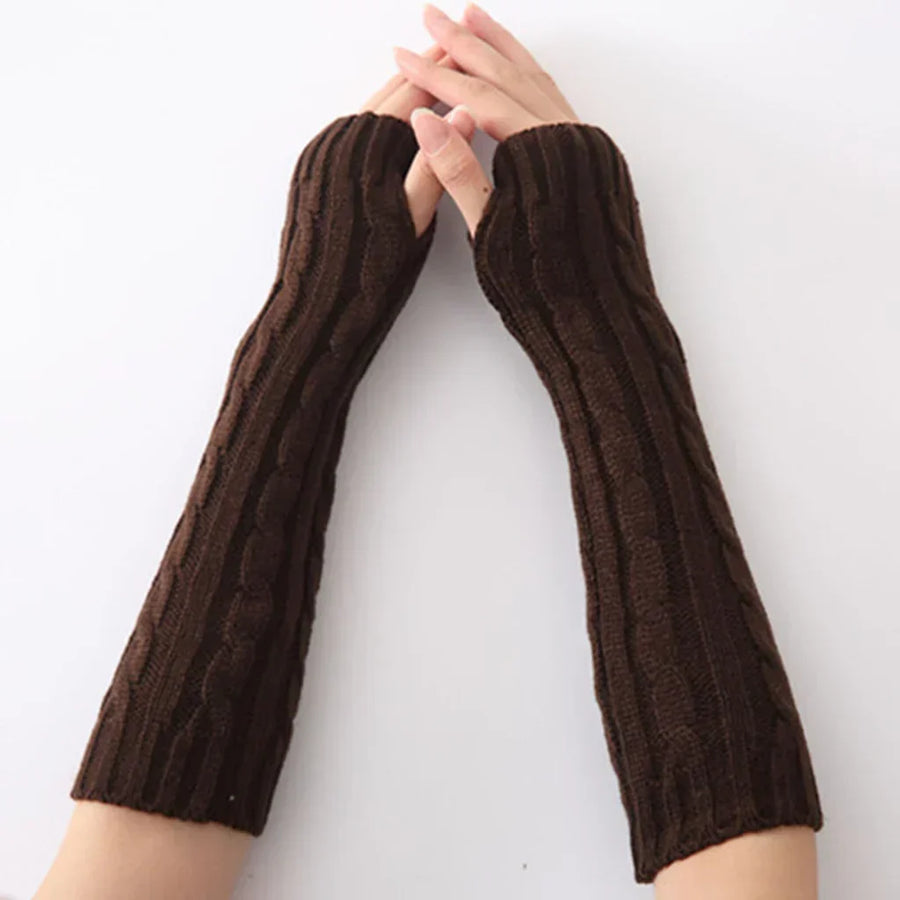 Rosa stickade handledsvärmare med tumhål, ribbstickad design