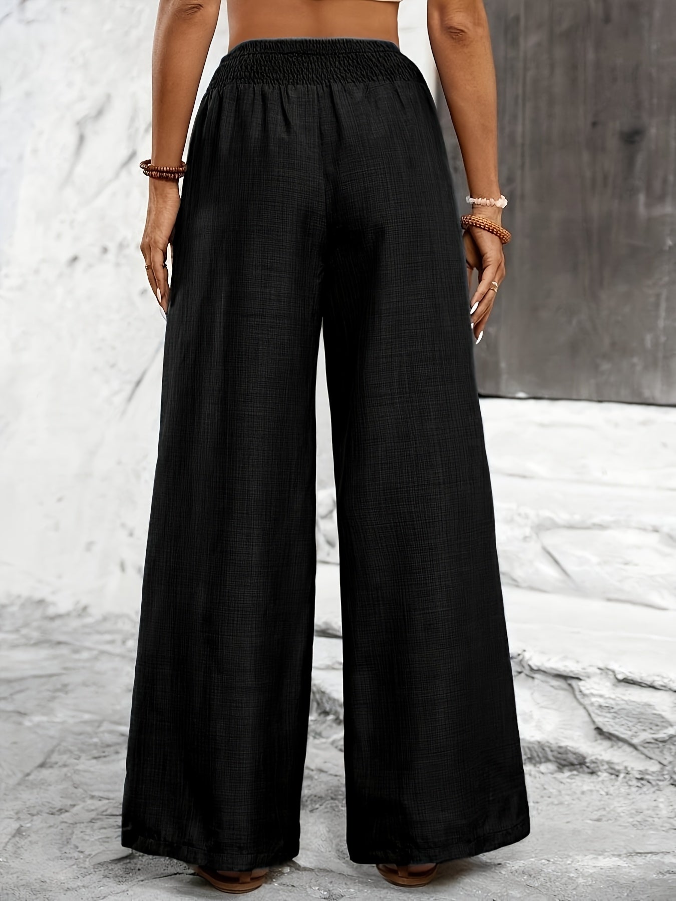 Dam Eleganta Vida Byxor med Smockad Midja för Avslappnad och Stilren Look