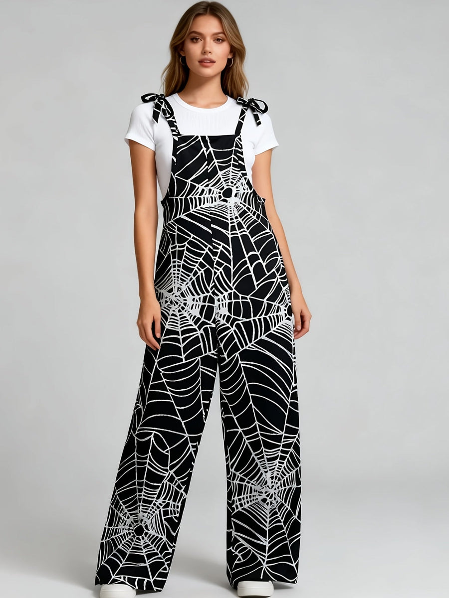 Dam jumpsuit med spindelnätsmönster och breda ben, svart