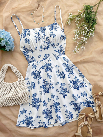 Damklänning med blommigt mönster och smala axelband – Elegant sommarklänning för fest och vardag