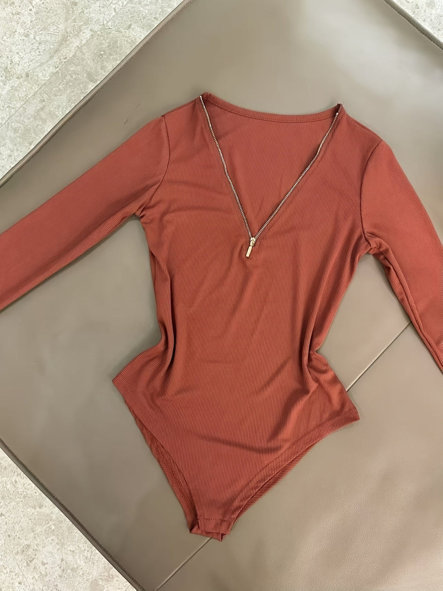 Dam bodysuit med dragkedja i ribbat material och lång ärm, flerfärgad