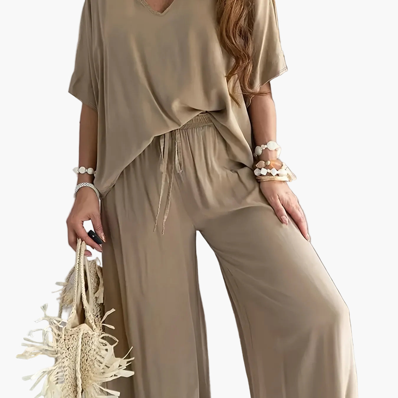 Dam Jumpsuit med V-ringning och Vida Ben – Avslappnad Sommarstil för Fritid och Semester