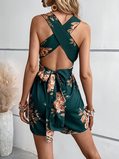 Dam Playsuit med Djup V-ringning och Blommigt Mönster – Elegant och Trendig Jumpsuit för Fritid och Fest