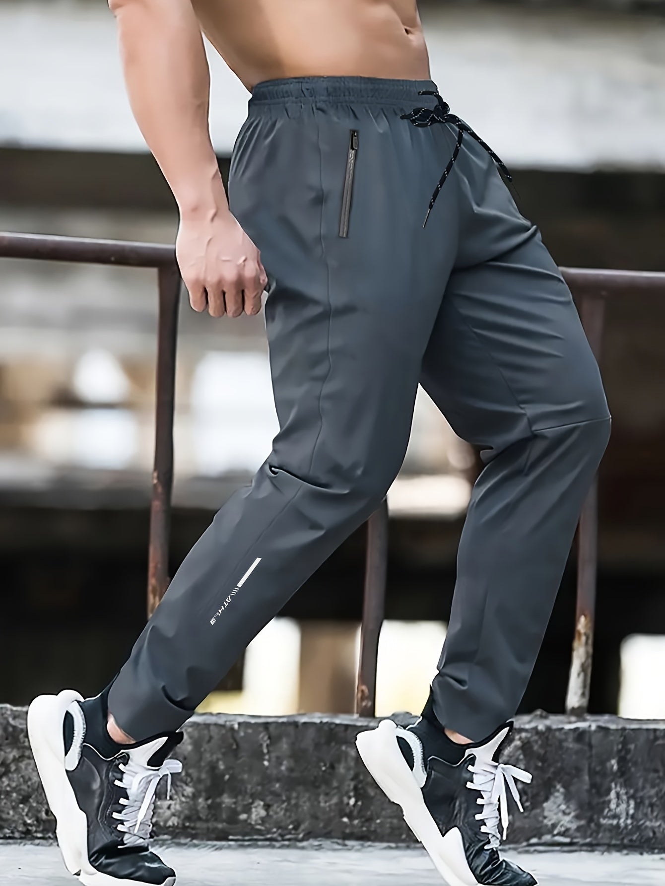 Herrarnas sportiga joggingbyxor för träning och fritid – avslappnad stil med dragkedjefickor
