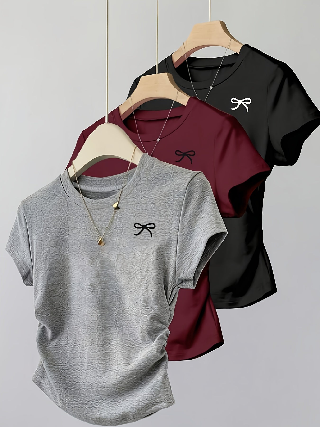 Dam T-shirt med rosettbroderi, vardagsstil, smickrande passform