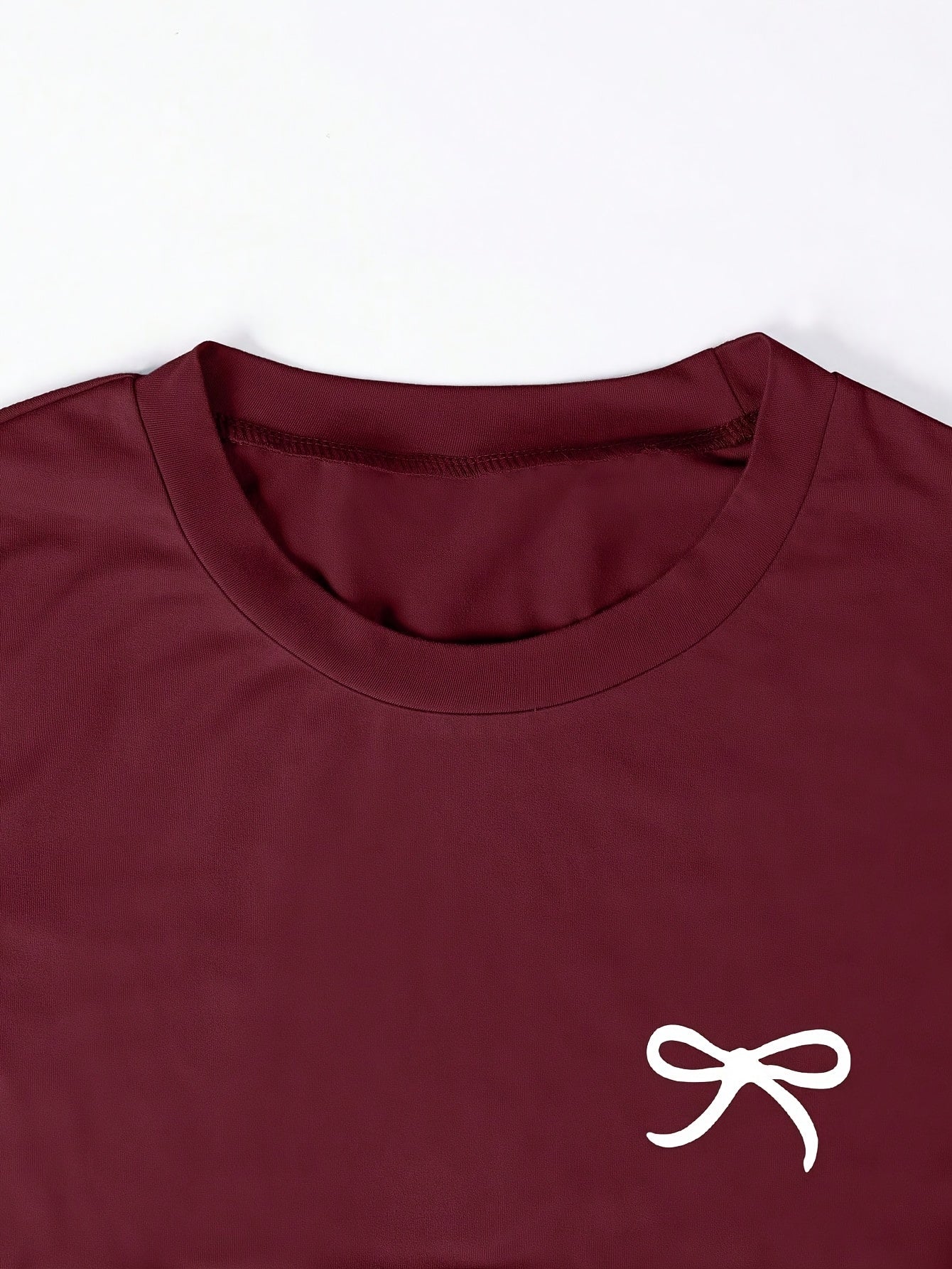 Dam T-shirt med rosettbroderi, vardagsstil, smickrande passform