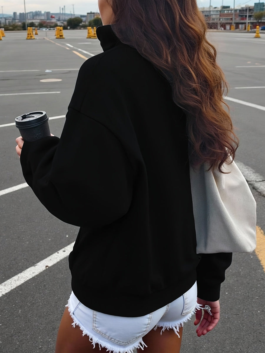 Kort sweatshirt med dragkedja, tryck och halvhög krage i mjukt material
