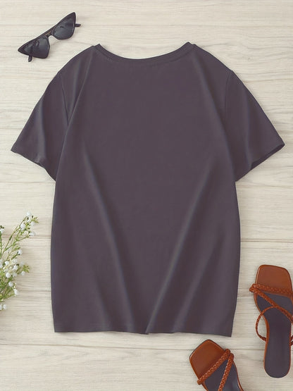 Dam T-shirt med blommigt och fjädertryck, avslappnad stil, perfekt för vardagsbruk