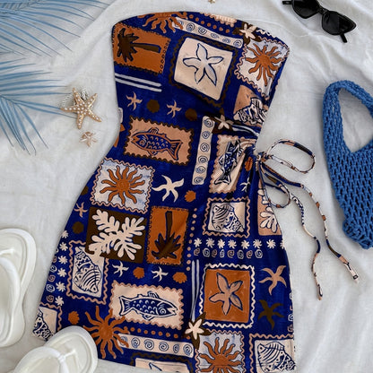 Dam Strandklänning Med Bandeau-Design Och Tropiska Motiv – Perfekt För Semester Och Sommar