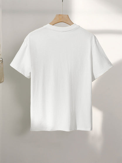 Dam T-shirt med djurmönster och inspirerande text – Trendig vardagstop med leopard- och zebramotiv