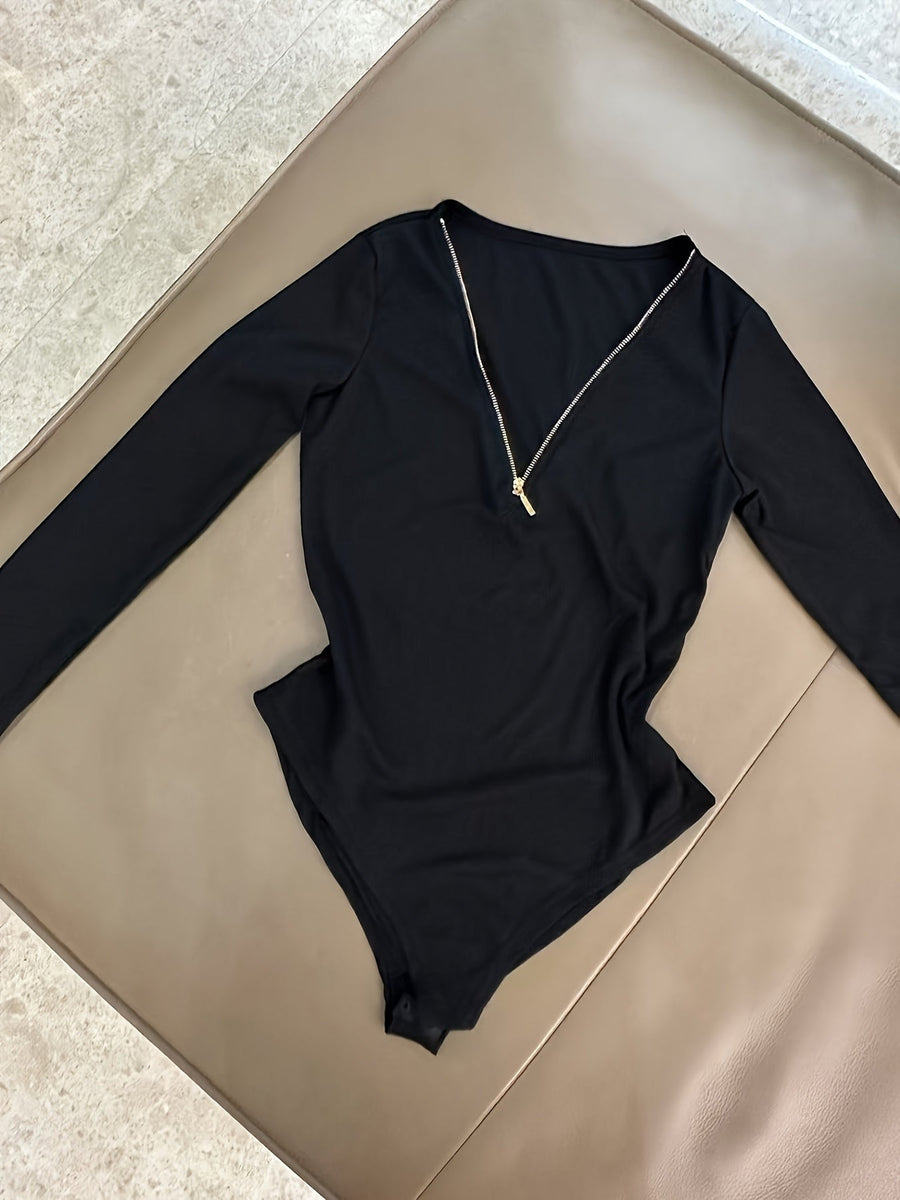 Dam bodysuit med dragkedja i ribbat material och lång ärm, flerfärgad